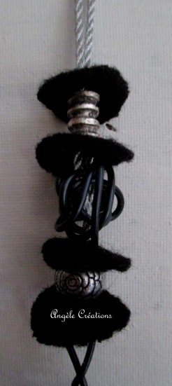 détail sautoir noir