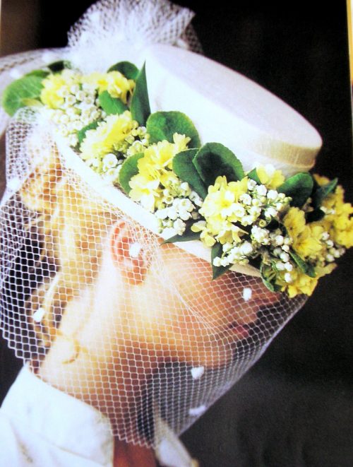 Guirlande en muguet sur canotier