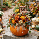 Pumpkin flower arrangement with autumn blooms, gourds, and plaid blanket
